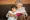 Women reading to a child